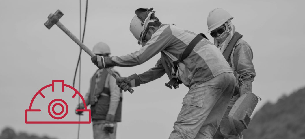 A person holding a jack hammer.